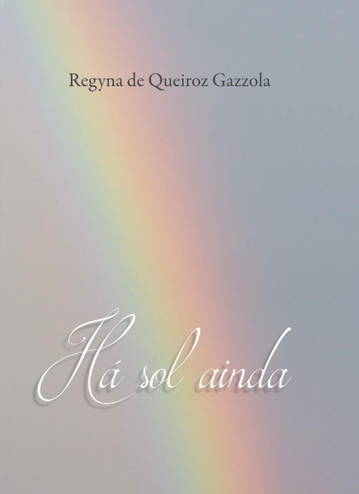 Capa do livro "há sol ainda" com reflexo de arco íris